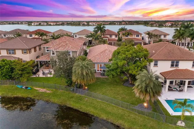 $949,900 | 9730 Blue Isle Bay, Parkland, FL 33076