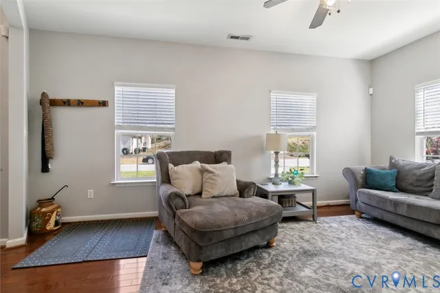 a bedroom with double bed and a window