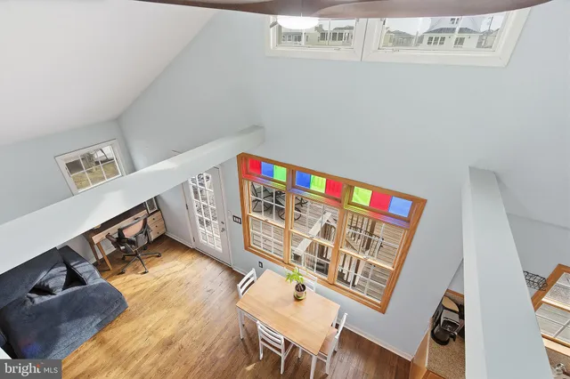 a view of a lake with boats and trees in the background