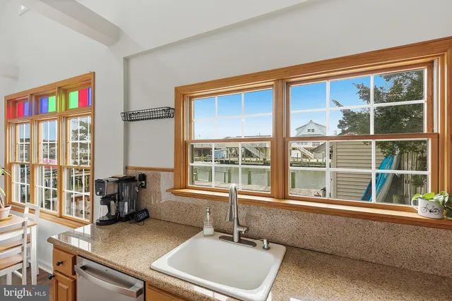 an aerial view of a city with ocean view