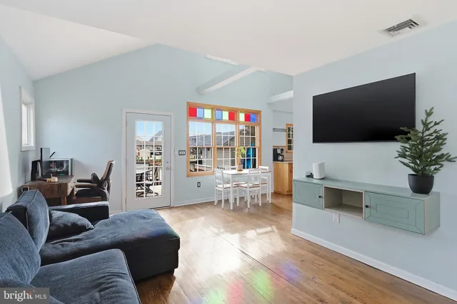 a view of a balcony and city view