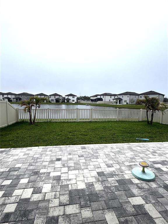 7545 Pool Compass Loop Wesley Chapel, FL 33545 - Photo 22 of 25 a view of a garden with a terrace