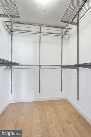 a view of a room with racks on the wall