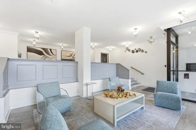 a living room with furniture and a couch