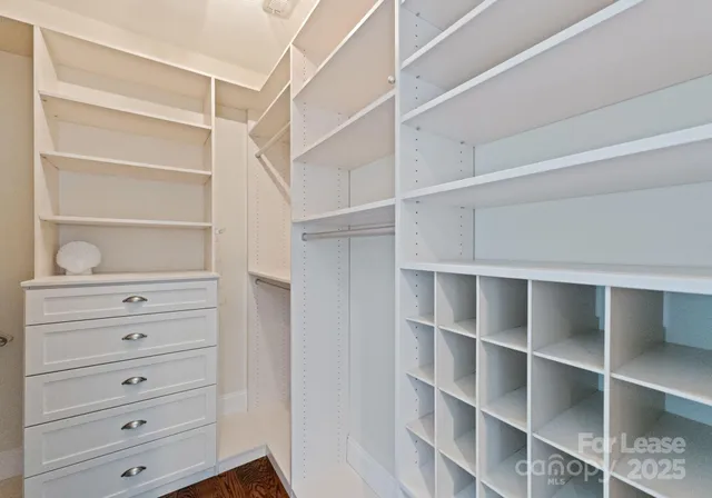 a view of an empty walk in closet