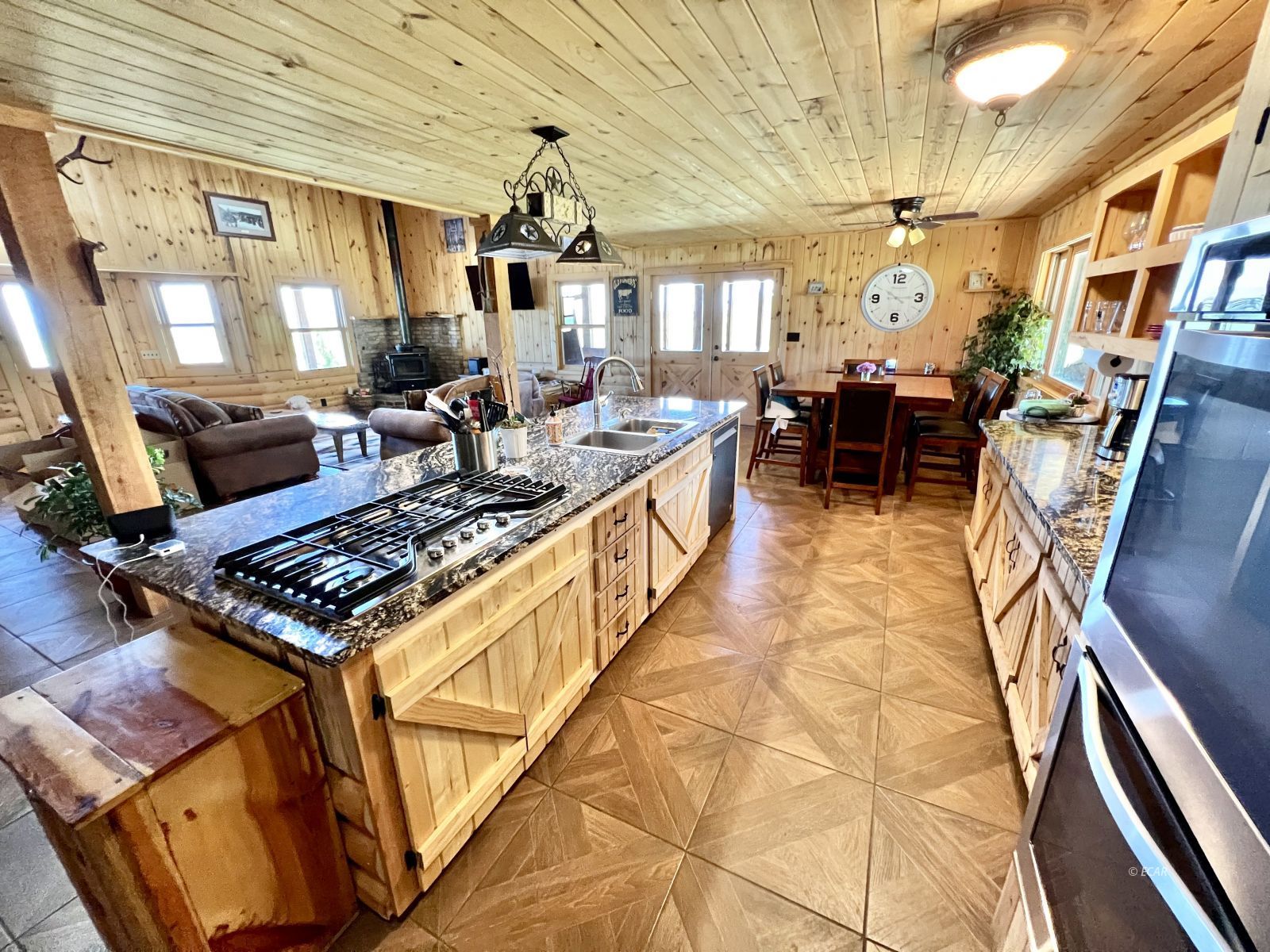 4513 Starr Valley Road Deeth, NV 89823 - Photo 2 of 49 a living room with lots of furniture and a rug