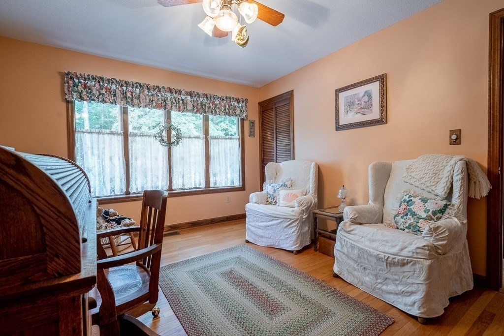 38 Zuell Hill Road Monson, MA 01057 - Photo 18 of 42 a living room with furniture and a window