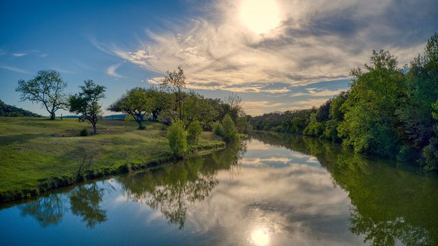 a view of a lake with houses
