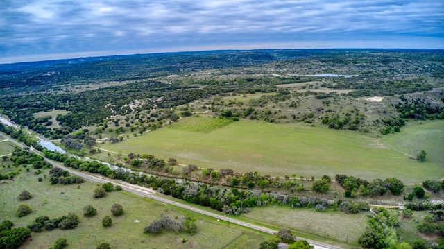 a view of a city with an ocean