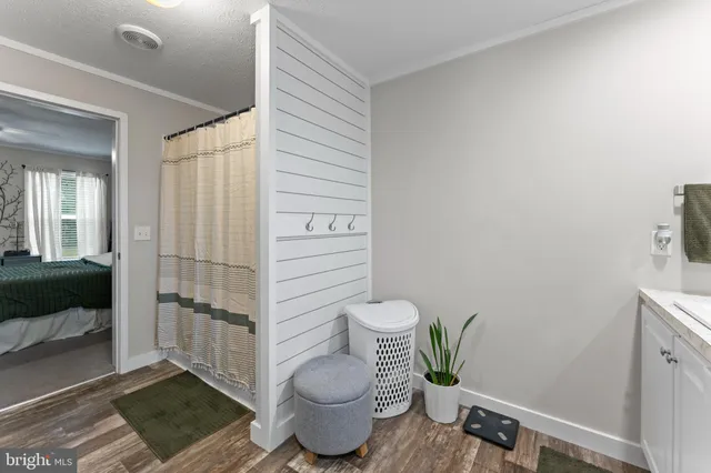 a view of a bathroom from the hallway