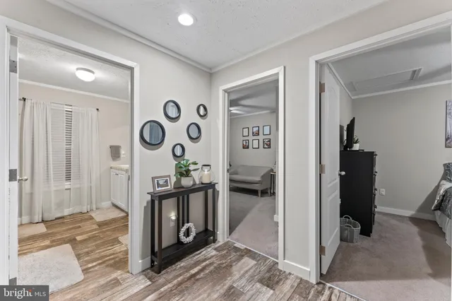 a bathroom with a double vanity sink mirror and