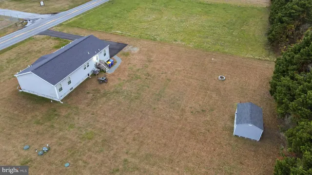 a view of a mini pool with a yard