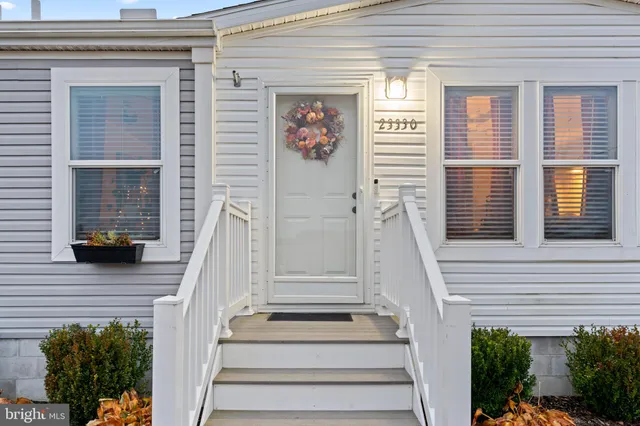 a living room with furniture fireplace and flat screen tv