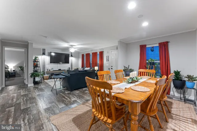 a view of a dining room with furniture window and outside view