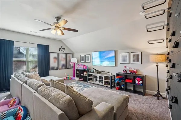 a view of yard and house with outdoor seating