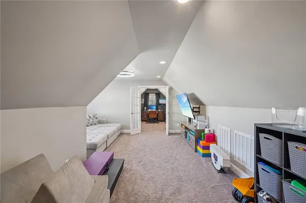 a view of a terrace with dining table and chairs