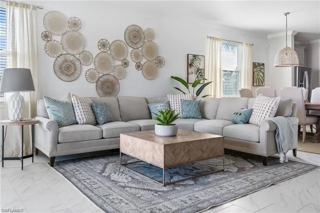 a living room with furniture and a rug
