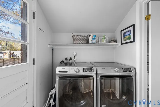 a utility room with dryer and washer
