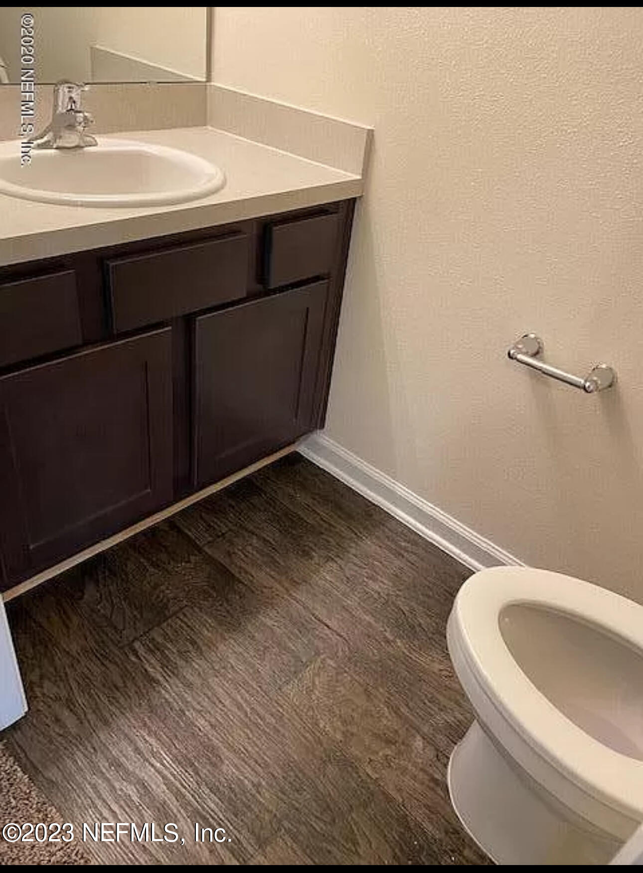 8111 Echo Springs Road Jacksonville, FL 32256 - Photo 6 of 6 a bathroom with a sink and a toilet