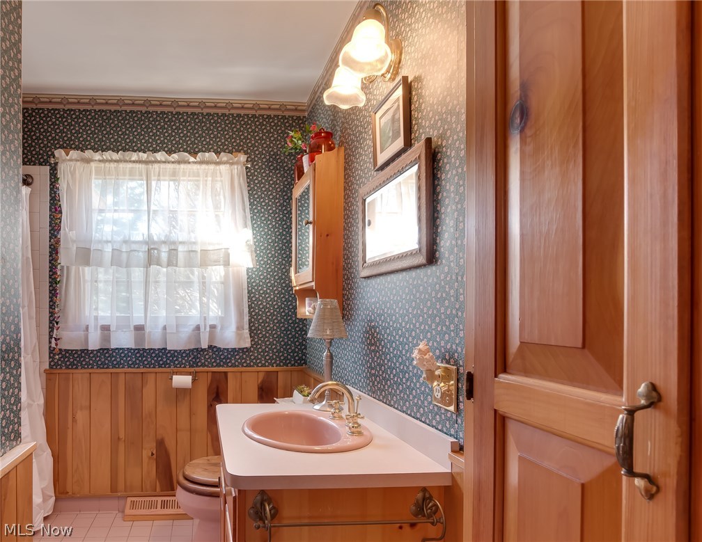 9790 Wilson Mills Road Chardon, OH 44024 - Photo 24 of 33 Great Poplar wall trim - taken directly off the property - country bathroom - full bath on main floor and full bath in lower level