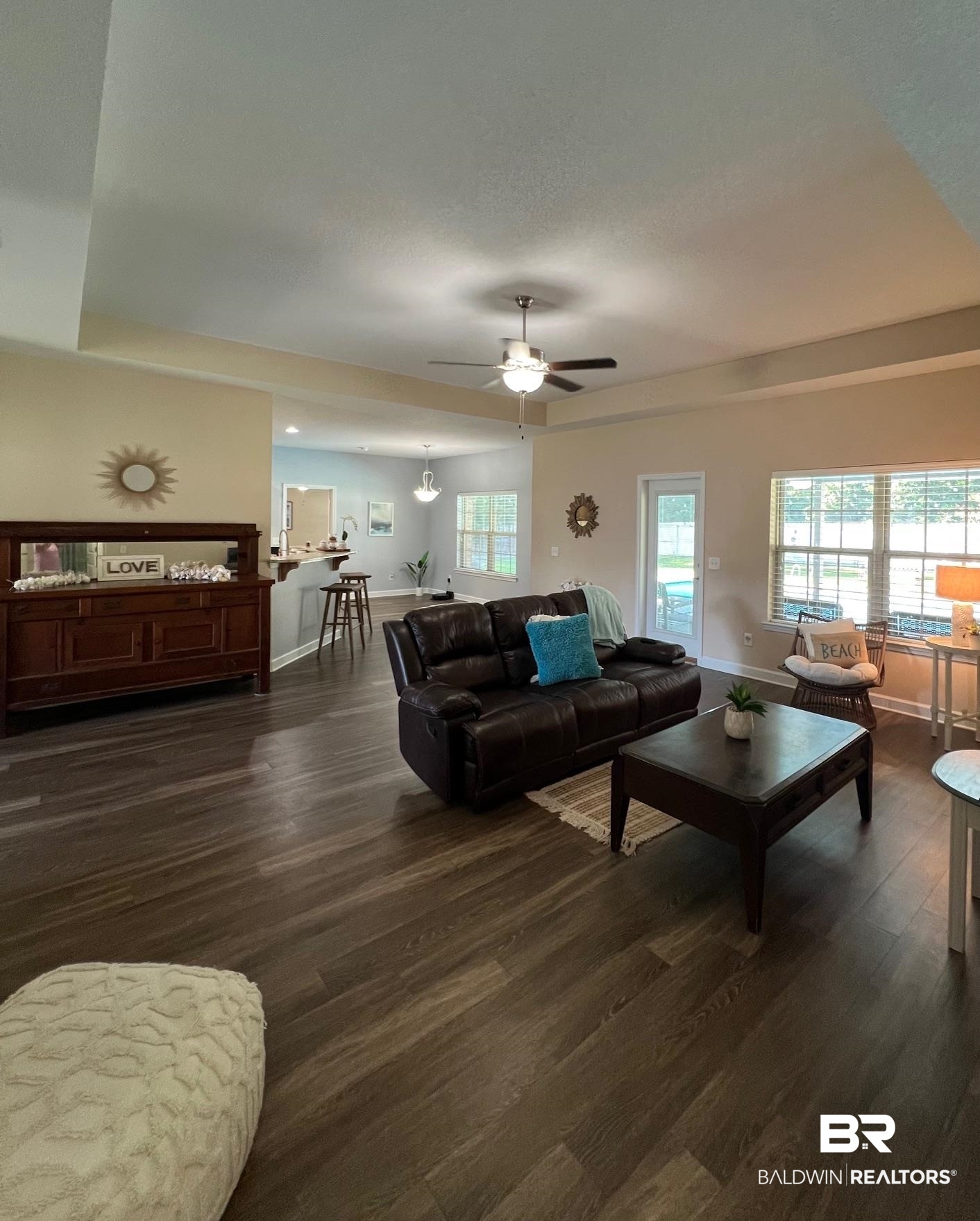 10257 Lyttleton Loop Lillian, AL 36549 - Photo 9 of 31 Living area with dark wood finished floors and a ceiling fan