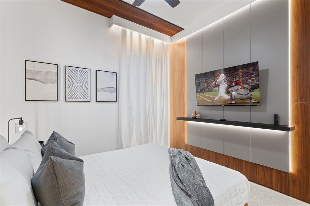 10467 Ebb Tide Lane Orlando, FL 32821 - Photo 11 of 40 a bedroom with furniture and a bed