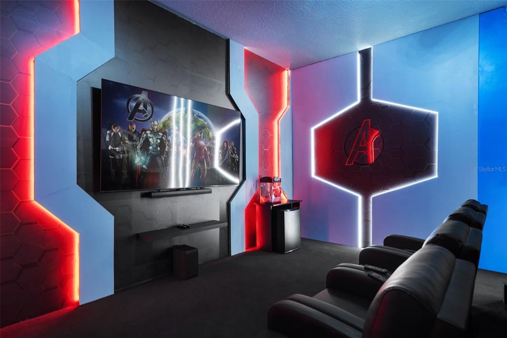 10467 Ebb Tide Lane Orlando, FL 32821 - Photo 15 of 40 a living room with furniture and a flat screen tv