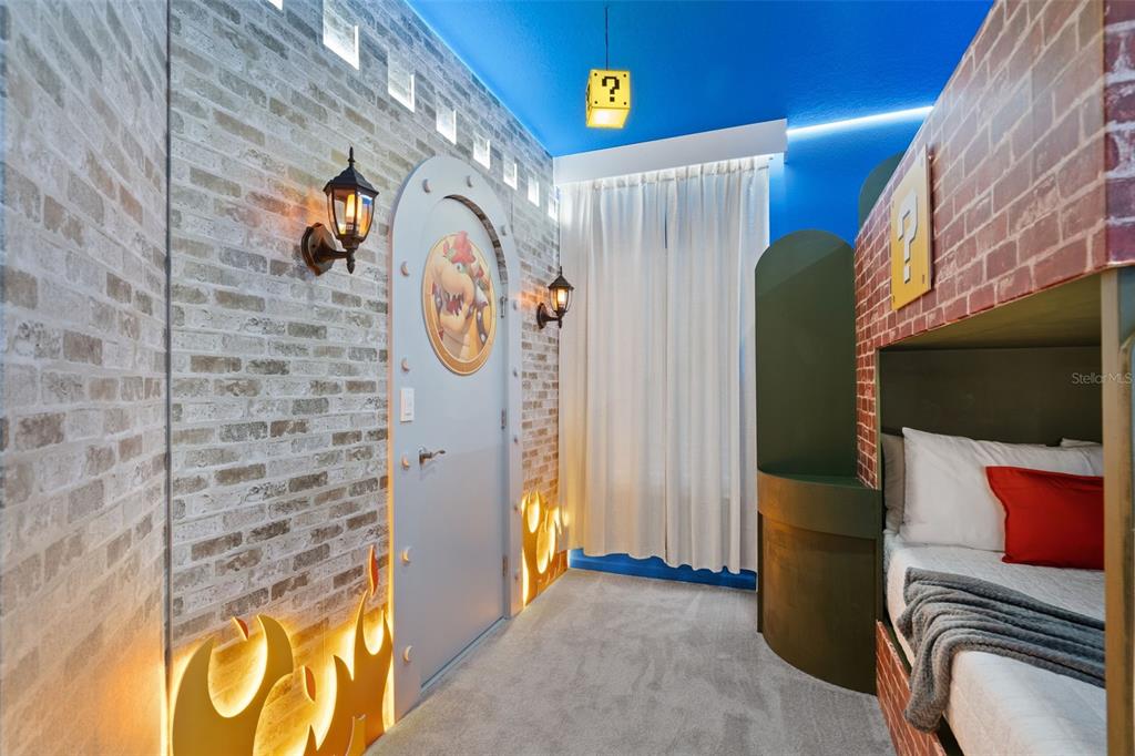 10467 Ebb Tide Lane Orlando, FL 32821 - Photo 19 of 40 a view of entryway with furniture and a fireplace