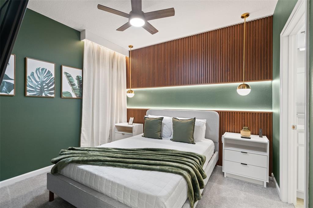 10467 Ebb Tide Lane Orlando, FL 32821 - Photo 26 of 40 a bedroom with a bed and a window