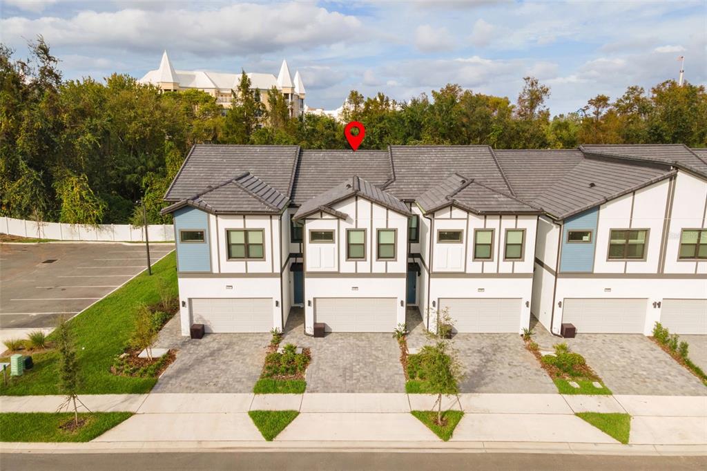 10467 Ebb Tide Lane Orlando, FL 32821 - Photo 37 of 40 a front view of a house with garden