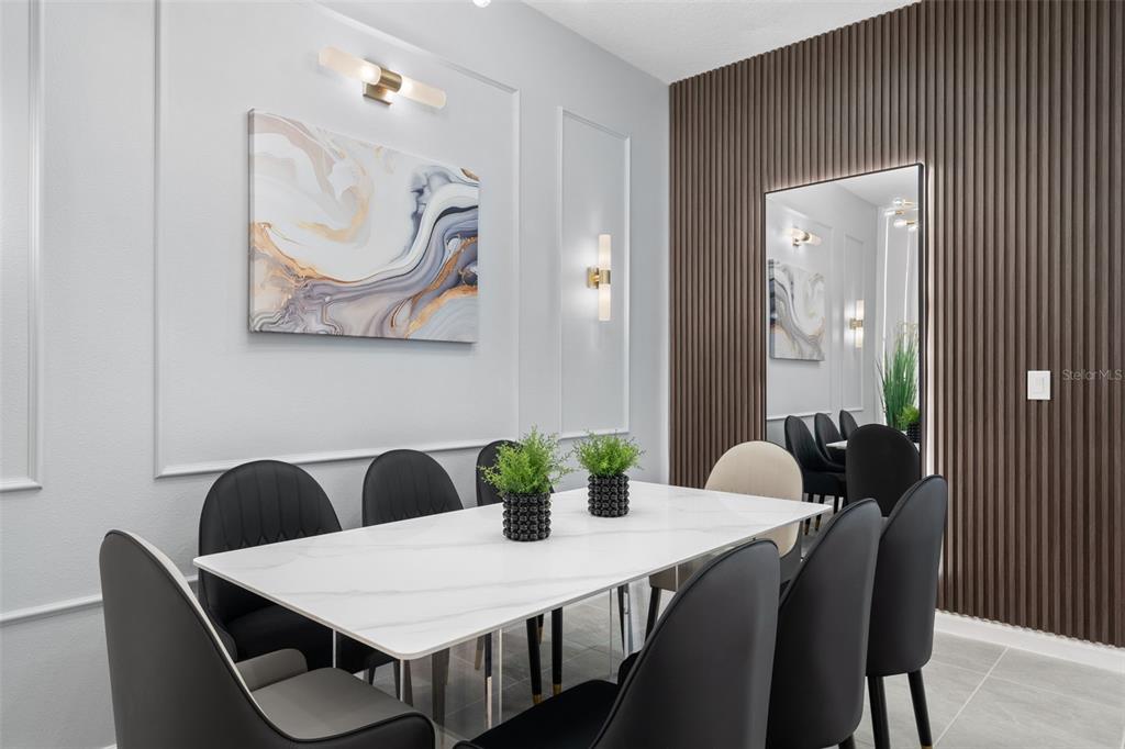 10467 Ebb Tide Lane Orlando, FL 32821 - Photo 7 of 40 a view of a dining room with furniture
