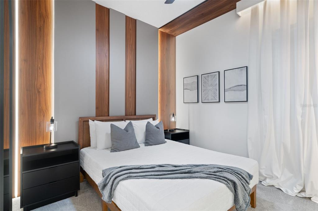 10467 Ebb Tide Lane Orlando, FL 32821 - Photo 10 of 40 a bedroom with a bed and a window