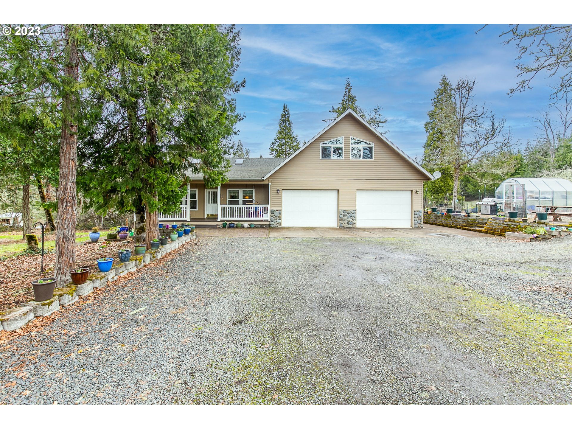 38395 Old Pengra Road Fall Creek, OR 97438 - Photo 1 of 32 a view of house with outdoor space and garden