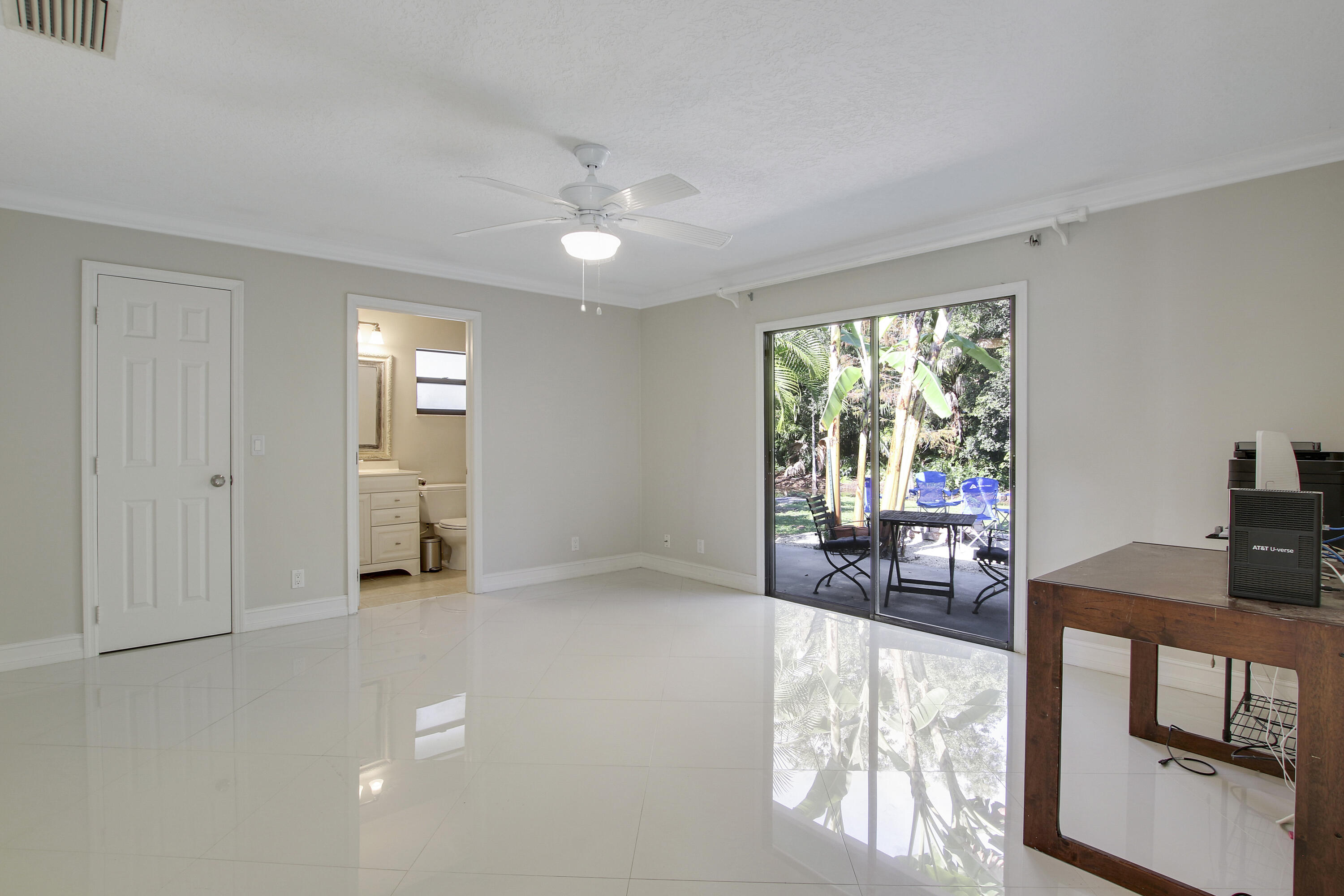 13431 153rd Road North Jupiter, FL 33478 - Photo 14 of 44 a view of a livingroom with furniture and floor to ceiling window