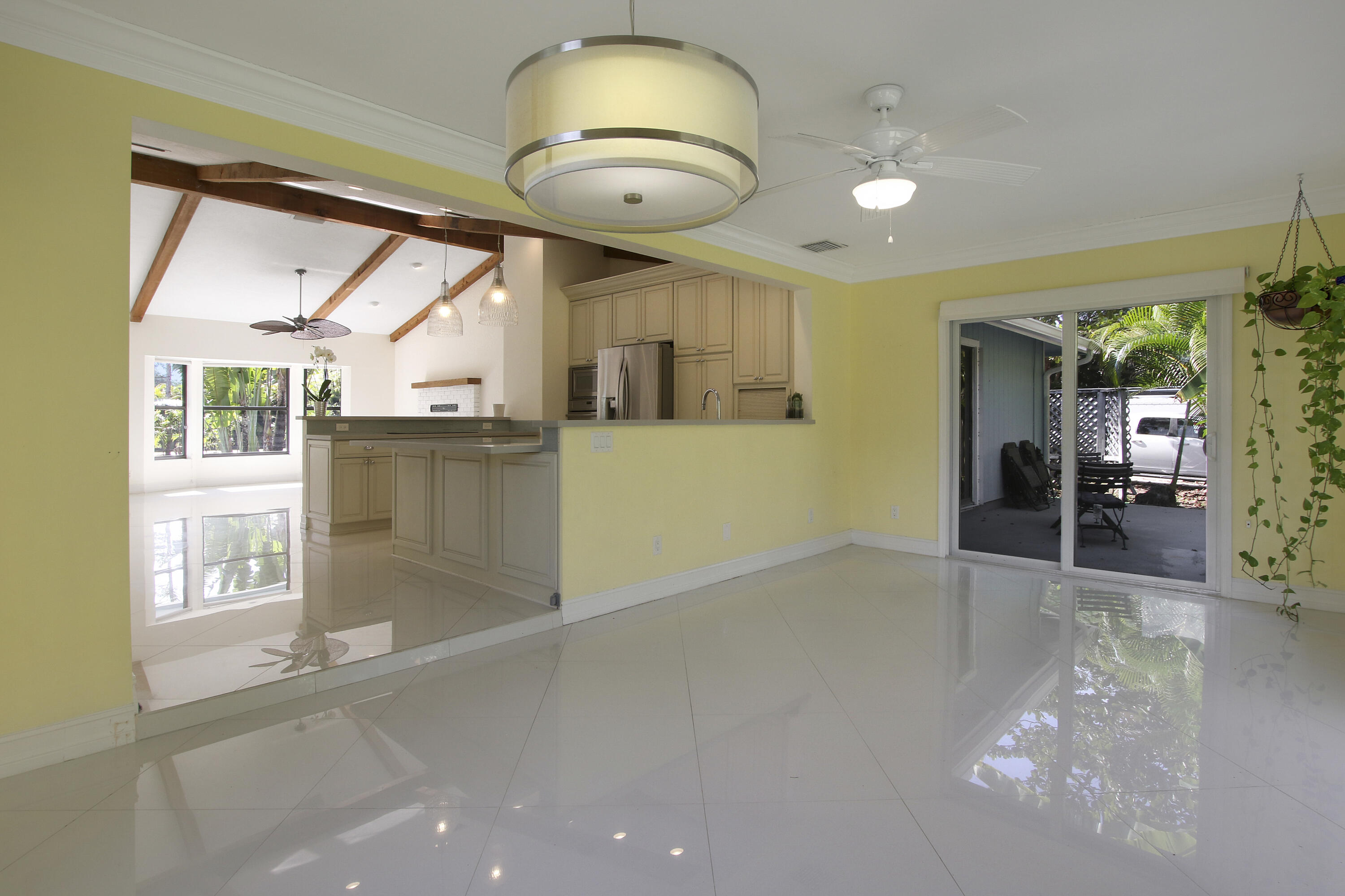 13431 153rd Road North Jupiter, FL 33478 - Photo 21 of 44 a view of a living room a window and a chandelier