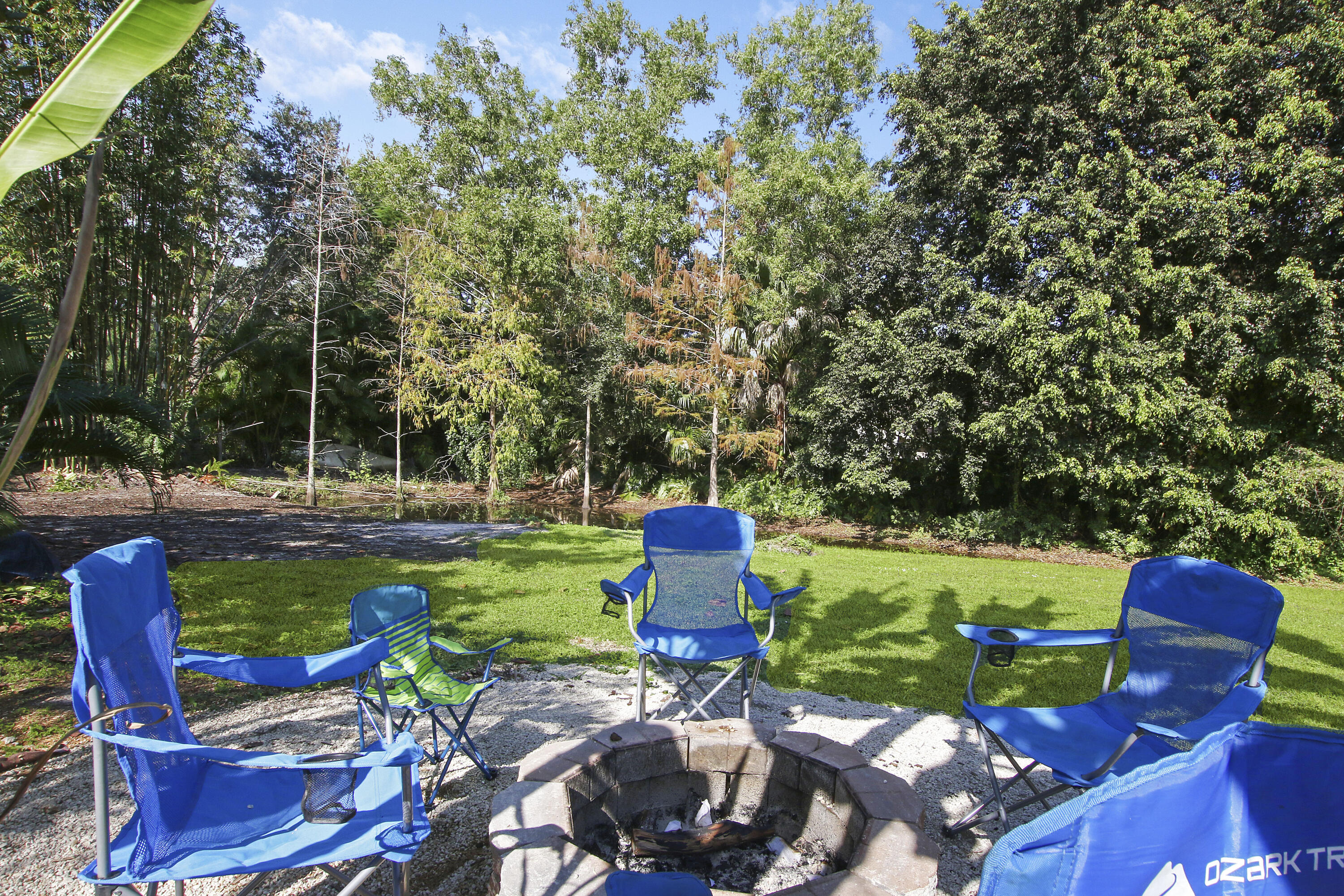 13431 153rd Road North Jupiter, FL 33478 - Photo 26 of 44 a view of a table and chairs in patio