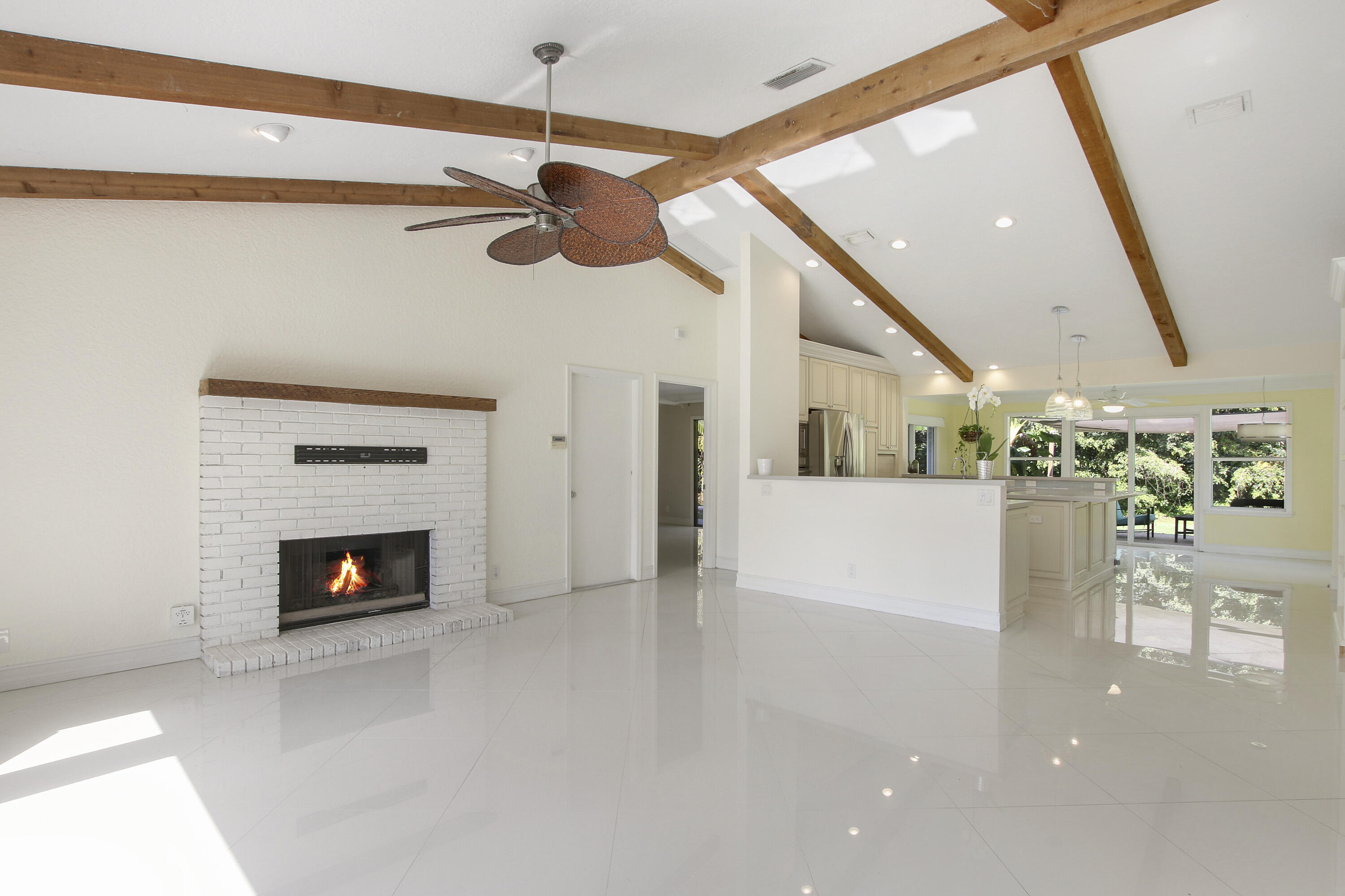 13431 153rd Road North Jupiter, FL 33478 - Photo 4 of 44 a view of an empty room fire place and a fireplace