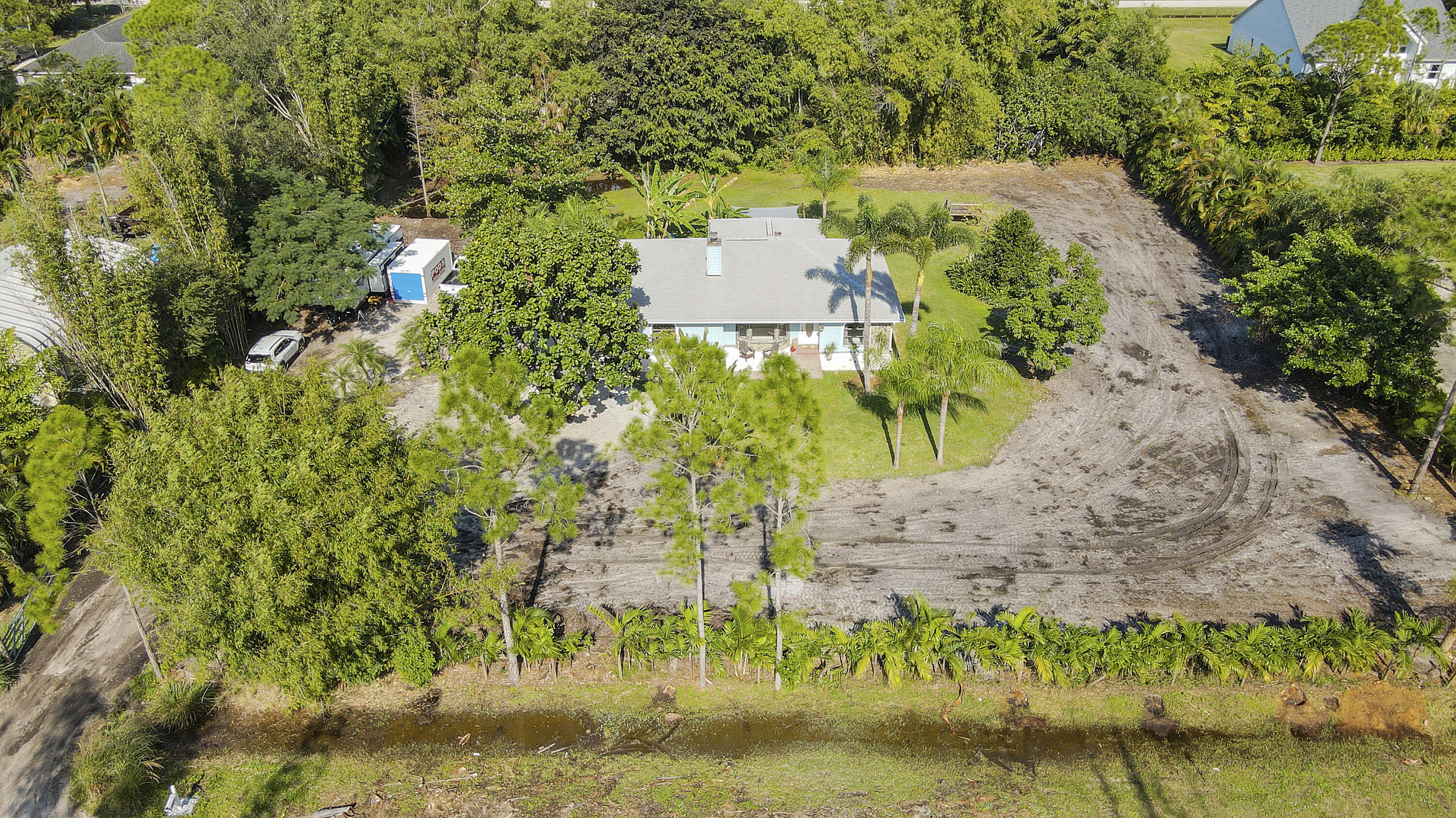 13431 153rd Road North Jupiter, FL 33478 - Photo 40 of 44 an aerial view of a house with a yard