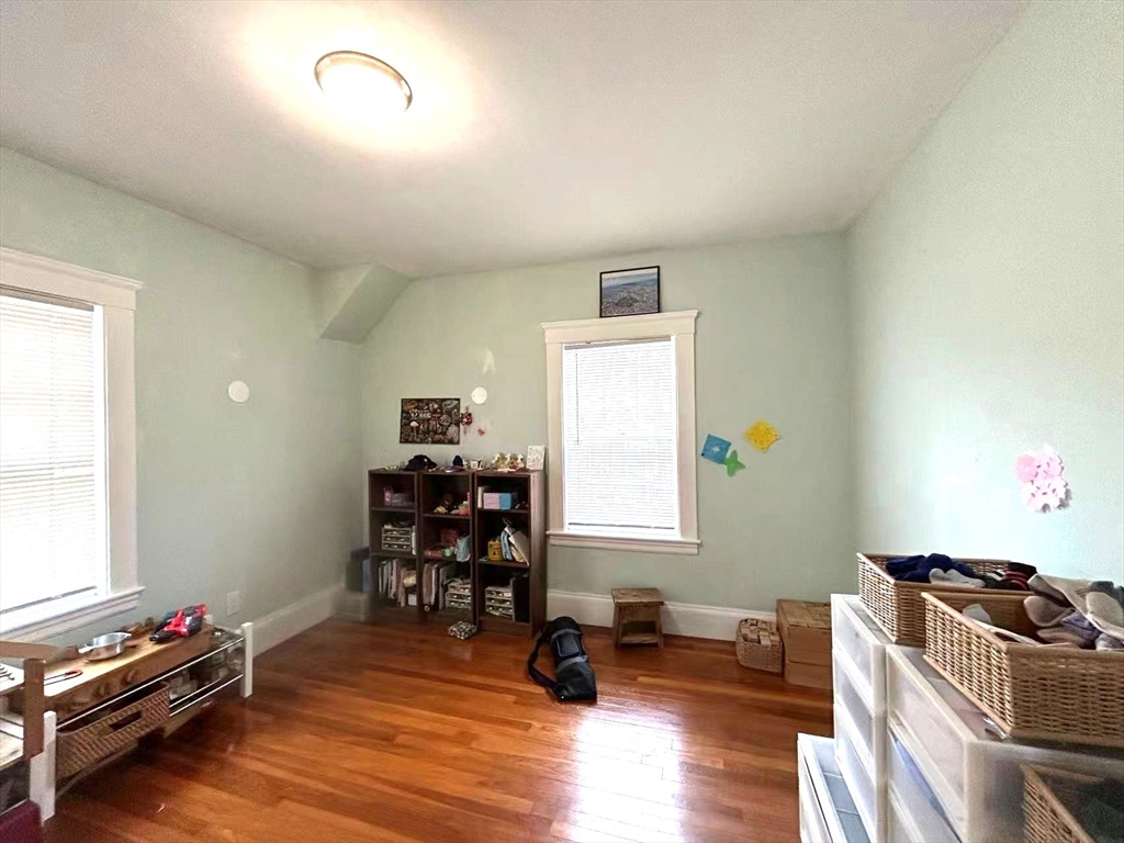 142 Jackson Street Newton, MA 02459 - Photo 2 of 16 a room with furniture and a window