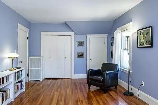 142 Jackson Street Newton, MA 02459 - Photo 4 of 16 a living room with furniture and a wooden floor
