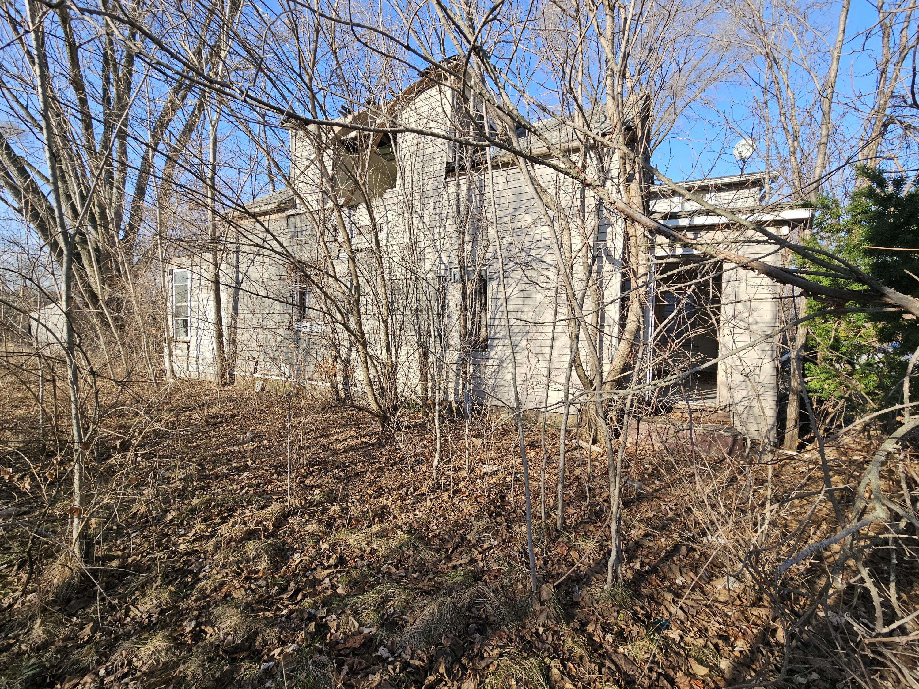 2612 Madison Street Gary, IN 46407 - Photo 3 of 11 a backyard of a house with lots of green space
