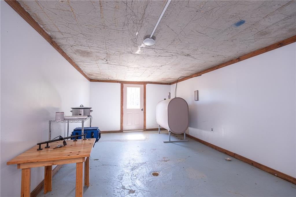 204 Marburger Road Evans City, PA 16033 - Photo 21 of 34 a room with furniture and window