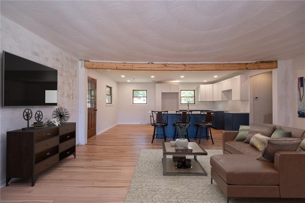 204 Marburger Road Evans City, PA 16033 - Photo 4 of 34 a living room with furniture and a flat screen tv