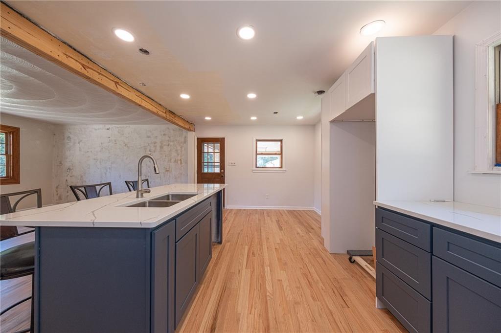 204 Marburger Road Evans City, PA 16033 - Photo 5 of 34 a kitchen with sink and mirror