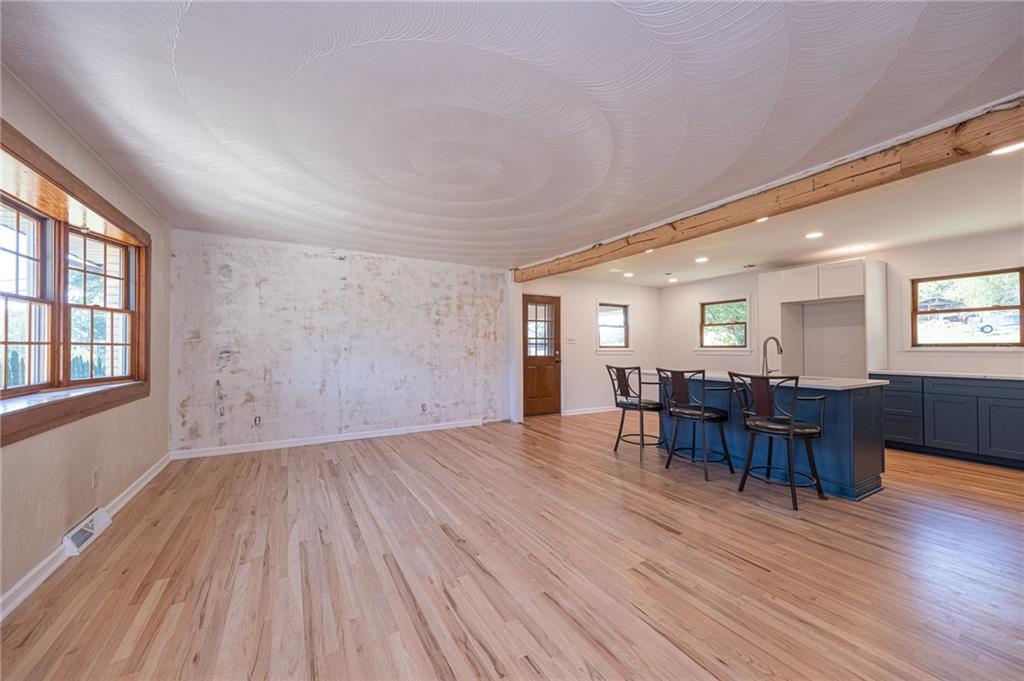 204 Marburger Road Evans City, PA 16033 - Photo 7 of 34 a view of workspace with wooden floor and furniture window