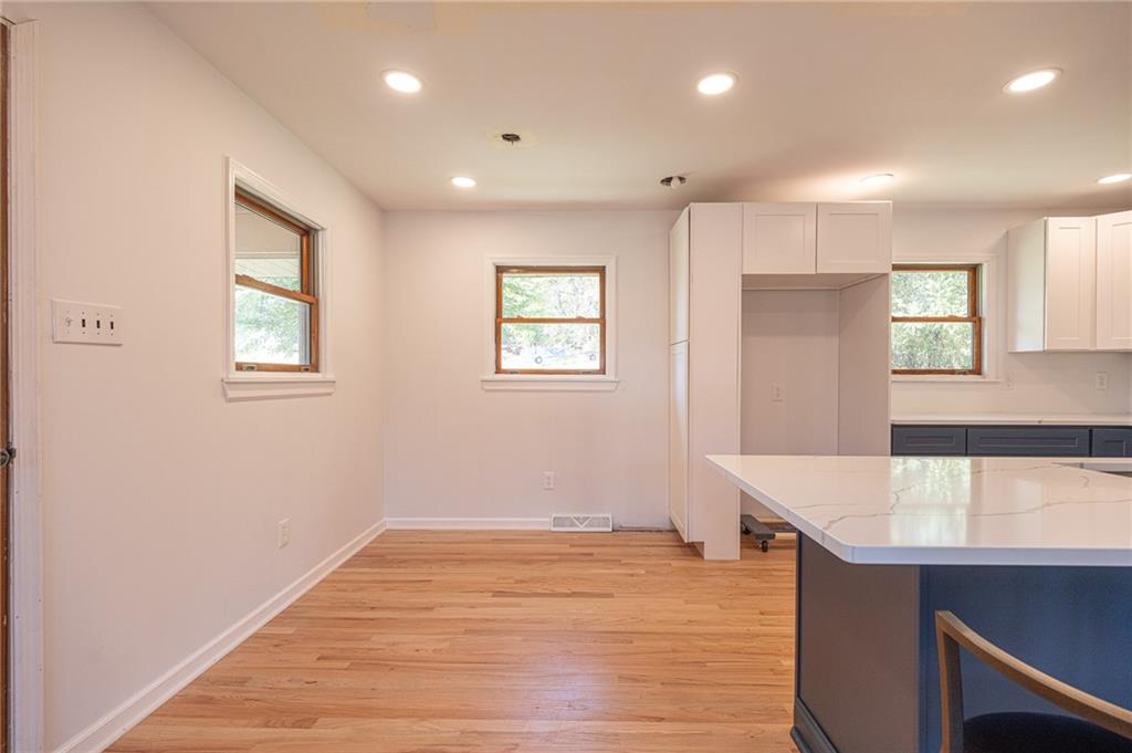 204 Marburger Road Evans City, PA 16033 - Photo 8 of 34 a view of kitchen with wooden floor and window