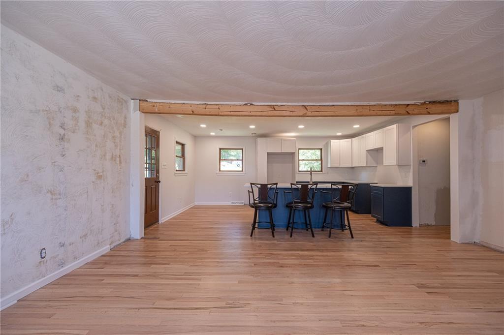 204 Marburger Road Evans City, PA 16033 - Photo 10 of 34 a view of dining room with furniture and chandelier