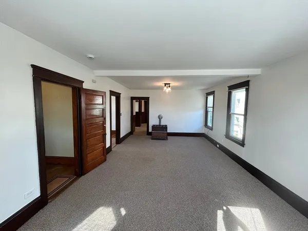a view of hallway with livingroom