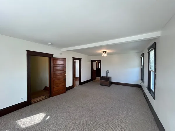 an empty room with windows