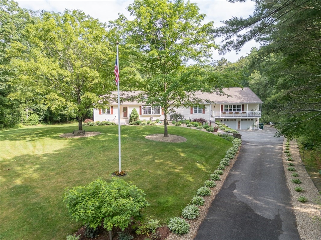 120 1/2 Lowell Road, Unit B Pepperell, MA 01463 - Photo 31 of 34 a house view with a garden space